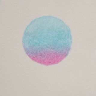 The artwork for this release. A pastel circle on a textured paper background. The circle fades from yellow lower left, through red at the centre, to black at the upper right.