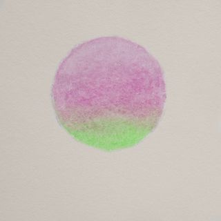 The artwork for this release. A pastel circle on a textured paper background. The circle fades from pink at the bottom to blue at the middle and top.